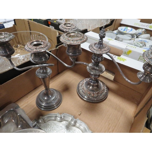 61 - A tray of  metal ware to include candelabra  together with a tray of oriental style tea ware