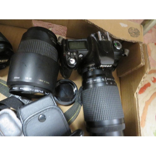 69 - A box of collectable cameras and lenses