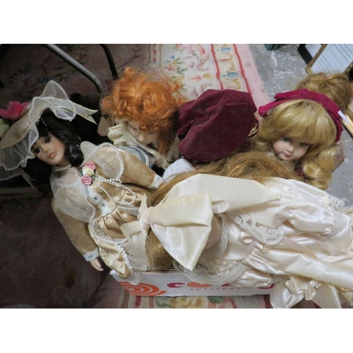 70 - A box of collectable dolls