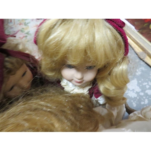 70 - A box of collectable dolls