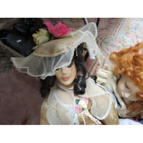 70 - A box of collectable dolls