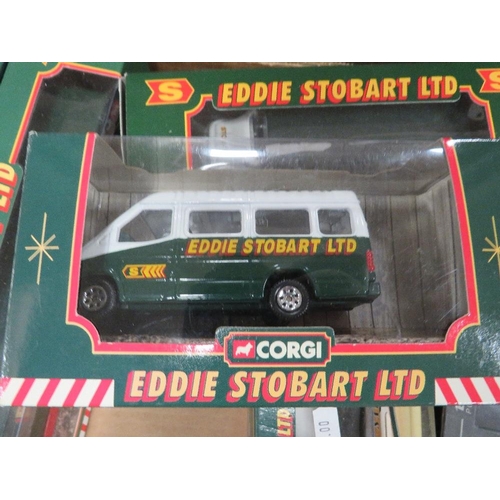 105 - A tray of Eddie Stobart collectables to include pocket watches