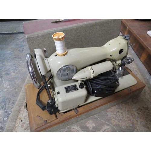 108 - A vintage cased Cresta electric sewing machine