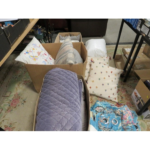 112 - Three boxes of decorative cushions and throws etc