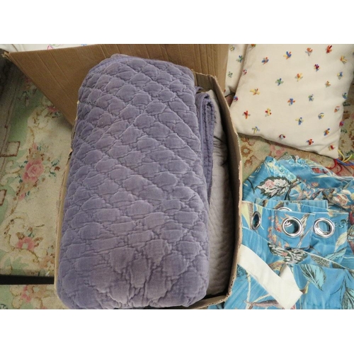 112 - Three boxes of decorative cushions and throws etc