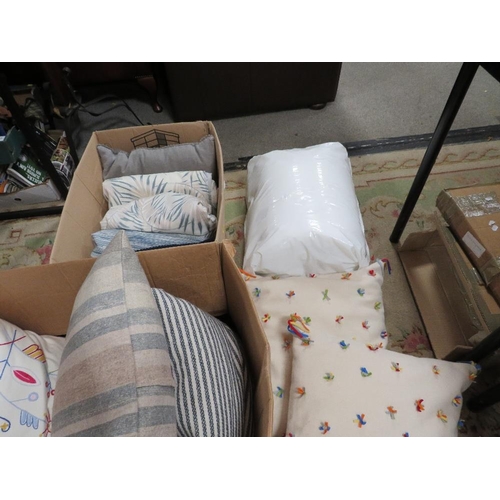 112 - Three boxes of decorative cushions and throws etc