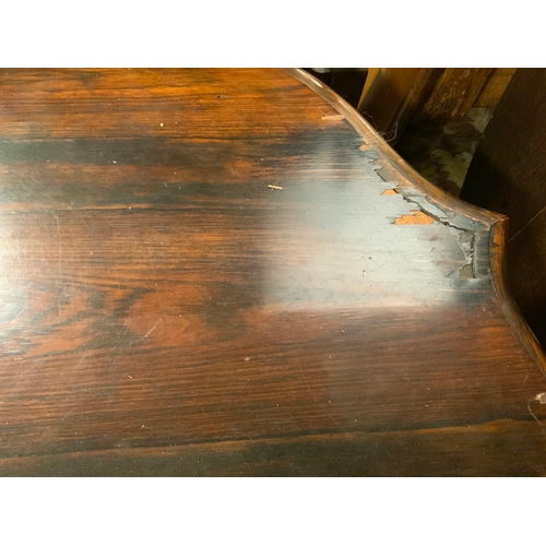 805 - An antique rosewood shaped centre table S/D