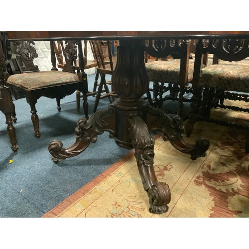 805 - An antique rosewood shaped centre table S/D