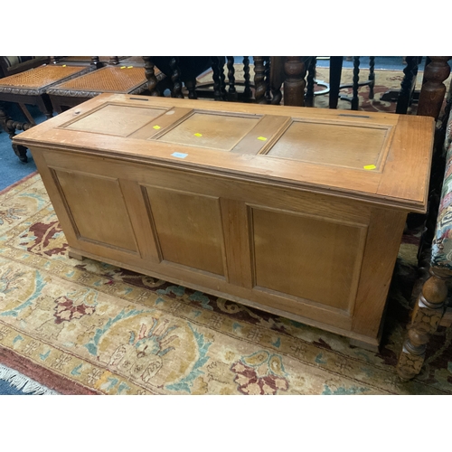 809 - A light oak panelled coffer W 111 cm