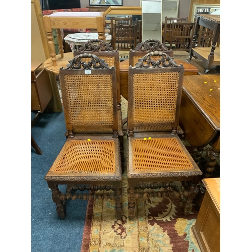 812 - A set of four antique oak bergere dining chairs S/D