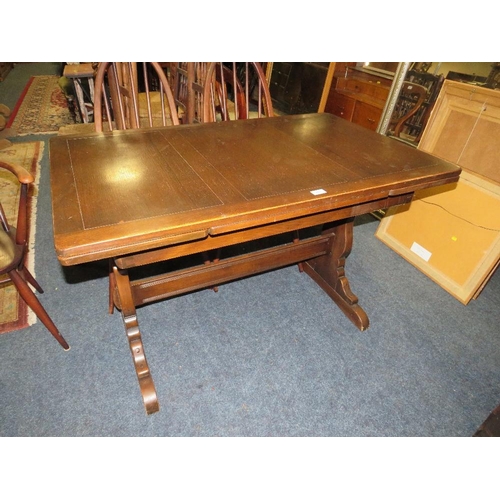 771 - An Ercol dining set comprising an extending table and four chairs