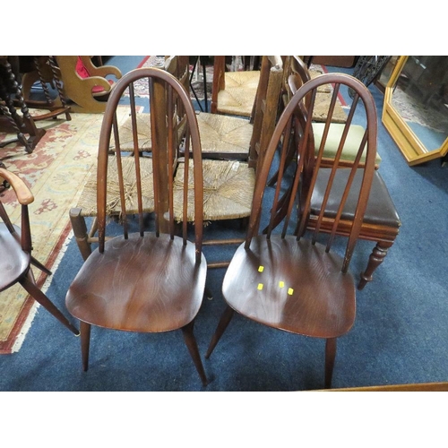 771 - An Ercol dining set comprising an extending table and four chairs