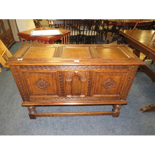 772 - A carved oak coffer - W 106 cm