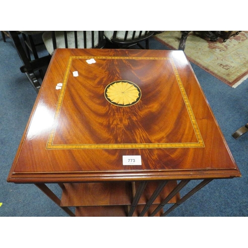 773 - An reproduction inlaid revolving bookcase