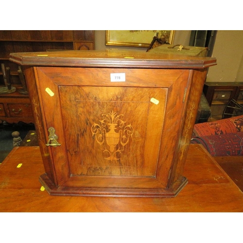 778 - A small Edwardian corner cupboard with inlaid decoration to door and top H - 47 cm