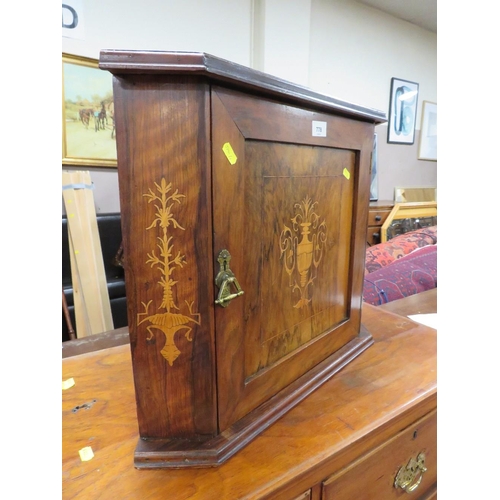 778 - A small Edwardian corner cupboard with inlaid decoration to door and top H - 47 cm