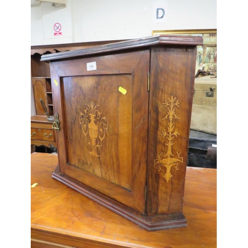 778 - A small Edwardian corner cupboard with inlaid decoration to door and top H - 47 cm