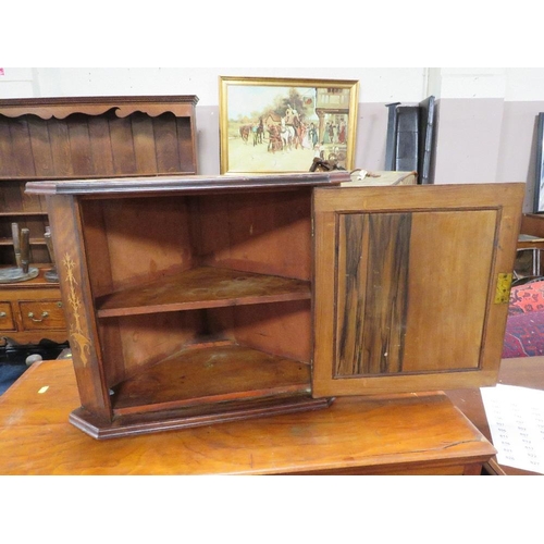 778 - A small Edwardian corner cupboard with inlaid decoration to door and top H - 47 cm