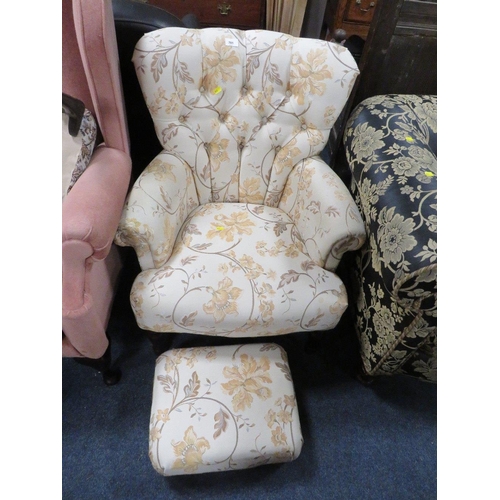 781 - A floral button backed armchair with matching footstool