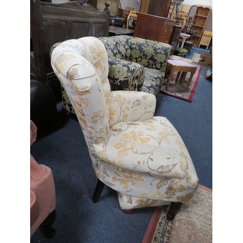 781 - A floral button backed armchair with matching footstool