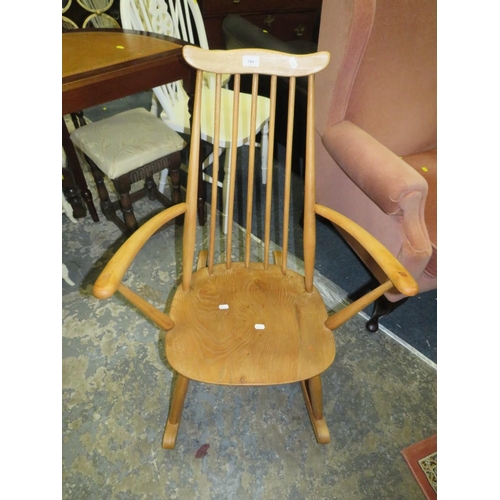 784 - An Ercol blonde oak rocking chair