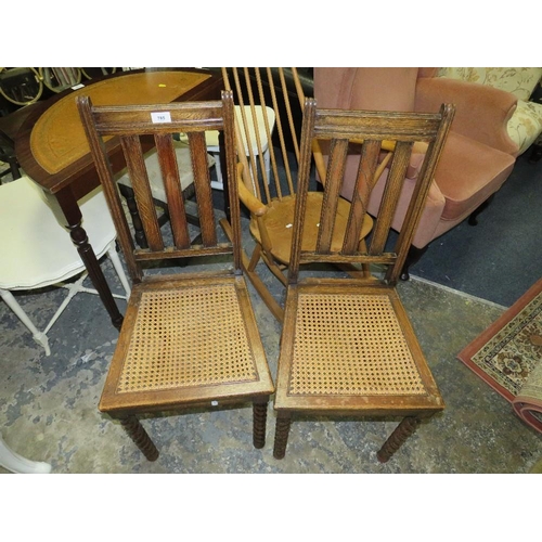 785 - Two oak bergere chairs with barleytwist legs