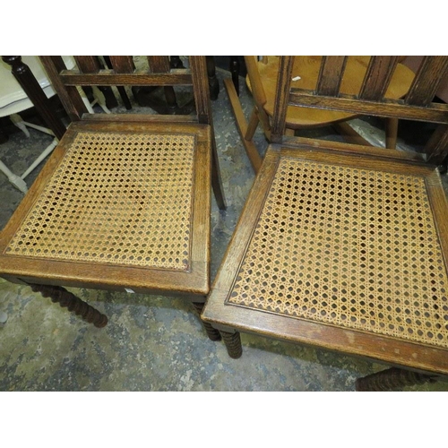 785 - Two oak bergere chairs with barleytwist legs