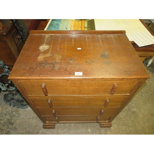 786 - An Art Deco oak cased four drawer chest - W 74 cm, A/F