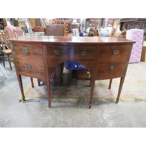 787 - An antique mahogany bow fronted sideboard - W148 cm