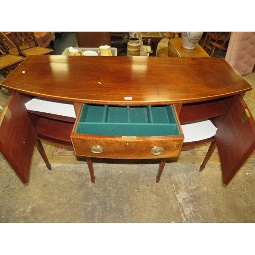 787 - An antique mahogany bow fronted sideboard - W148 cm