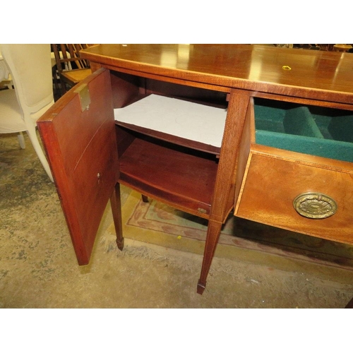 787 - An antique mahogany bow fronted sideboard - W148 cm