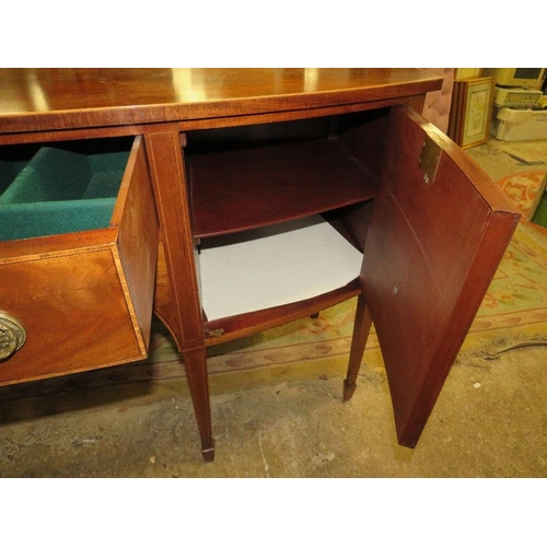 787 - An antique mahogany bow fronted sideboard - W148 cm