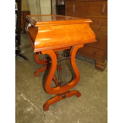 789 - A mahogany burr wood inlaid work table with lyre shaped legs - W 66 cm