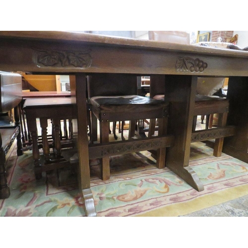 791 - A long oak carved refectory table - L 198 cm, together with four chairs