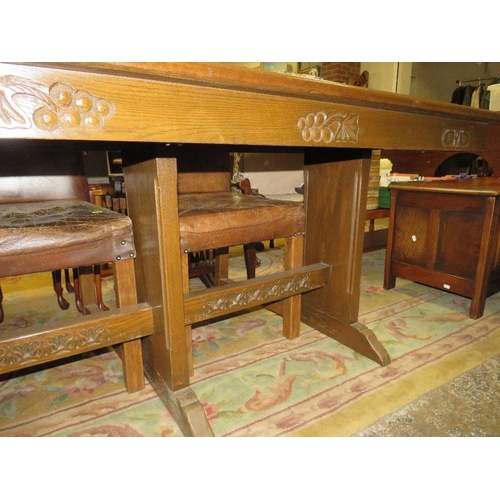 791 - A long oak carved refectory table - L 198 cm, together with four chairs