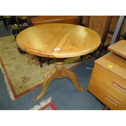 800 - A circular pine kitchen table together with a honey pine mirror and a pine stool (3)