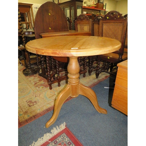 800 - A circular pine kitchen table together with a honey pine mirror and a pine stool (3)