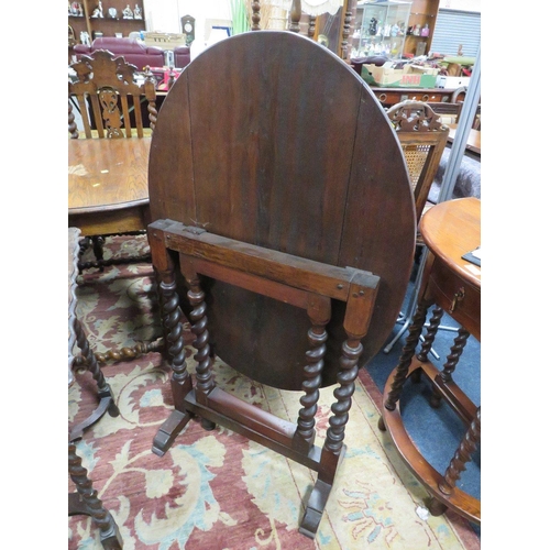 802 - A vintage oak barleytwist tilt top table / screen together with and two small oak tables (3)