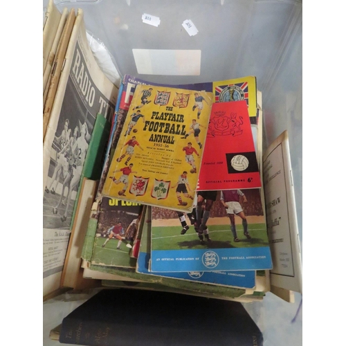 86 - Two boxes of vintage football programmes and match magazines from the 1950s to the 1980s, to include... 