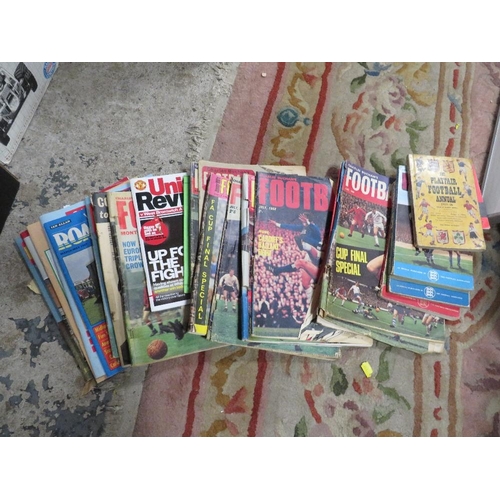 86 - Two boxes of vintage football programmes and match magazines from the 1950s to the 1980s, to include... 