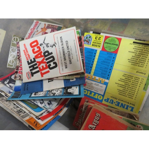 86 - Two boxes of vintage football programmes and match magazines from the 1950s to the 1980s, to include... 