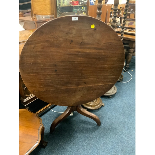 818 - An antique mahogany tilt top table