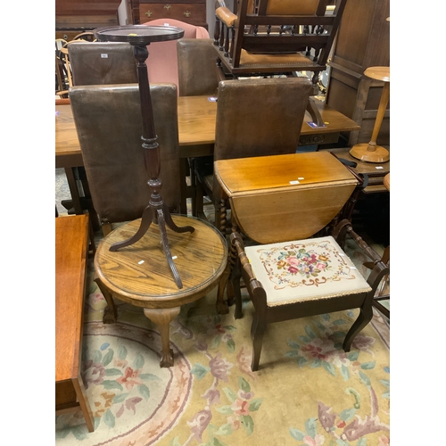 822 - An oak barley twist dropleaf table, mahogany piano stool, oak table and a plant stand (4)