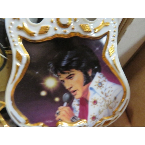 104 - A tray of Elvis collectables to include 7