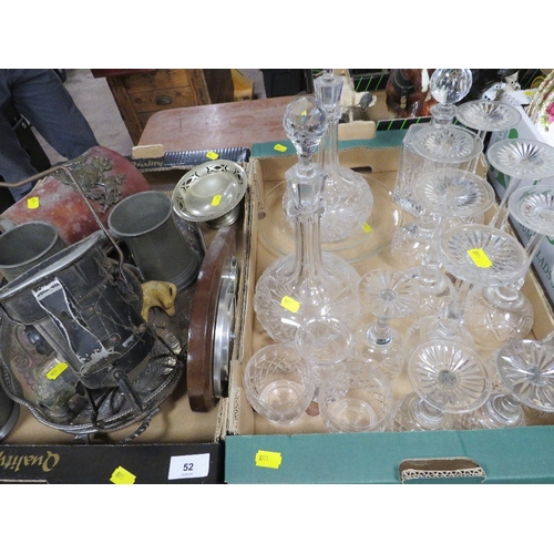 52 - A tray of assorted cut glass and decanters together with a tray of metal ware etc