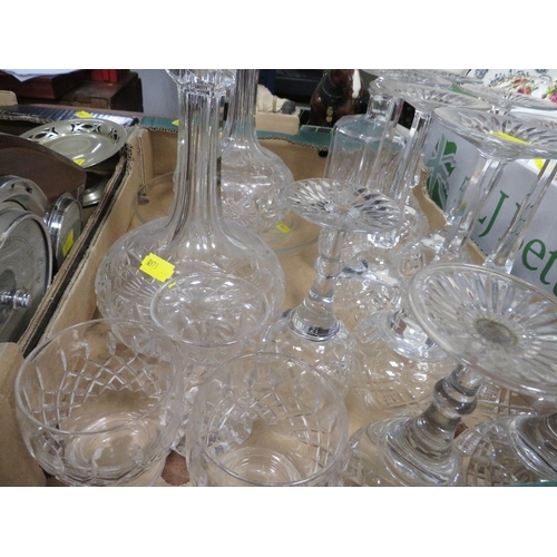 52 - A tray of assorted cut glass and decanters together with a tray of metal ware etc