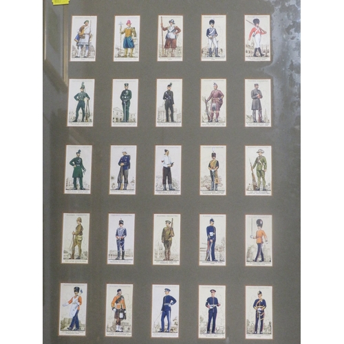 14 - Seven assorted framed cigarette cards to include golfers