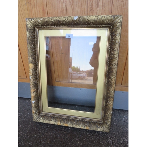 32 - A 19TH CENTURY GOLD FRAME, with gold slip and outer leaf design, glazed, with some restoration, fram... 