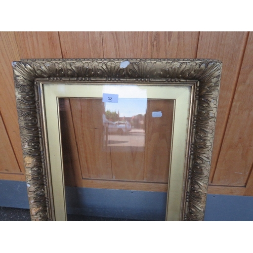 32 - A 19TH CENTURY GOLD FRAME, with gold slip and outer leaf design, glazed, with some restoration, fram... 