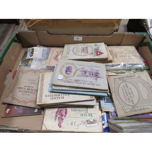 57 - A box of early cigarette card albums